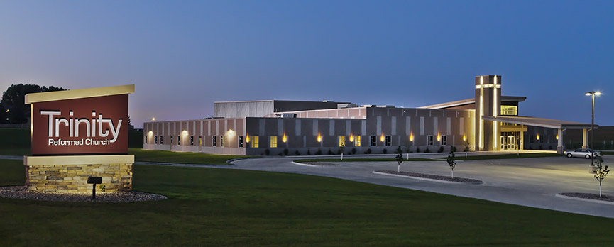 Trinity Church Orange City Campus building at night